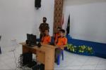 I tre imputati nel tribunale di Tanjung Pinang